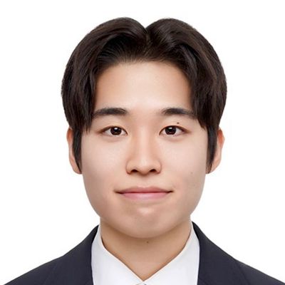 Professional headshot of a young man in formal attire.