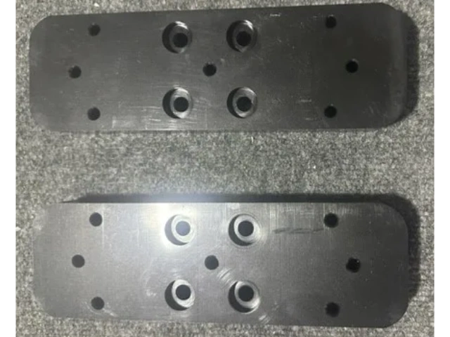 SNOWBOARD BINDING RISER