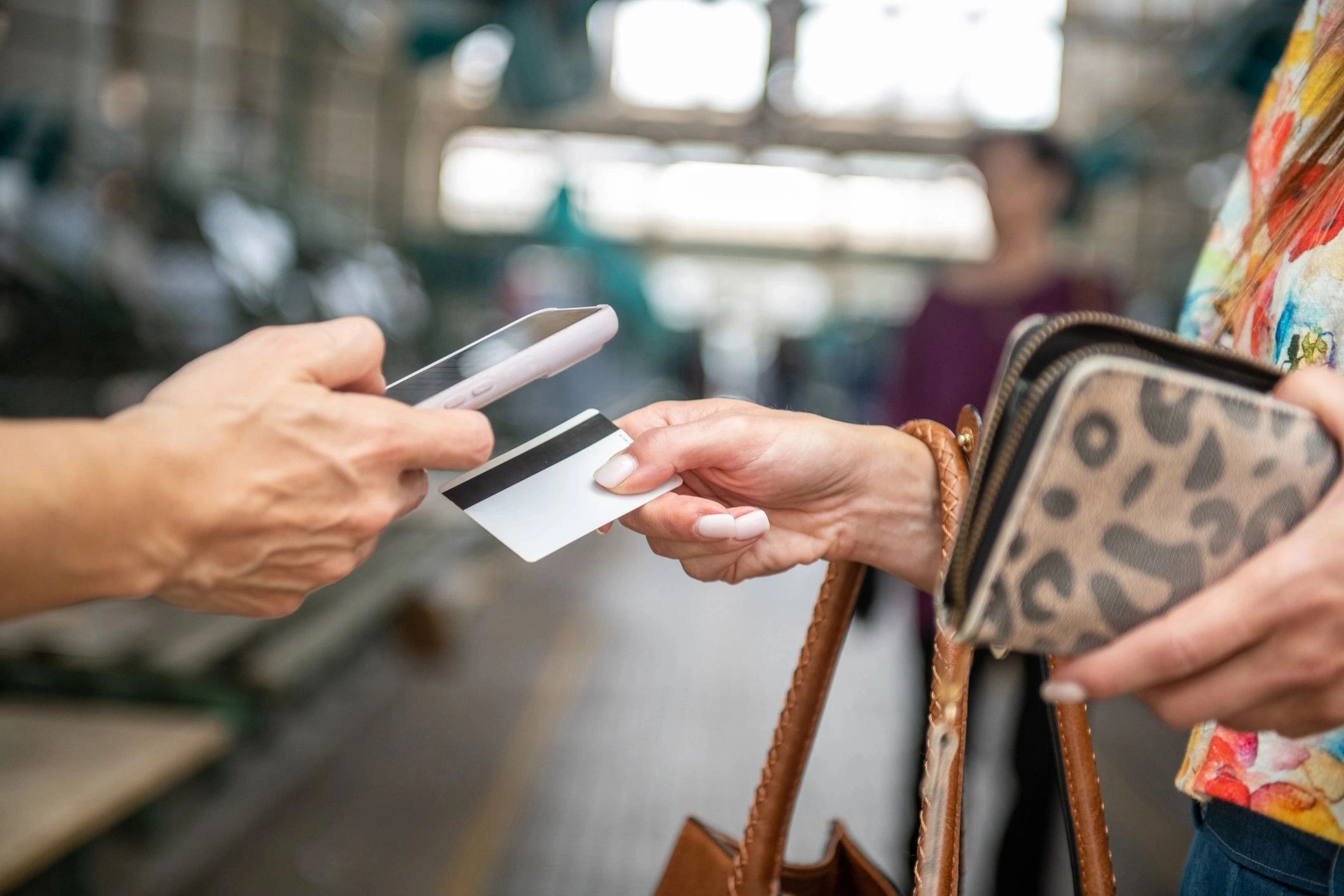 Customer using payment processing machine