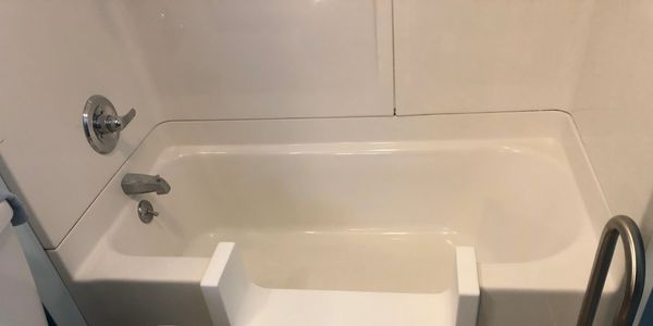 This is an example of how we can keep your bathtub accessible to you. We also have a door option. 