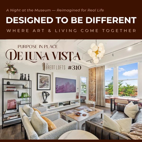 Modern living room in De Luna Vista with art-inspired design and large windows.
