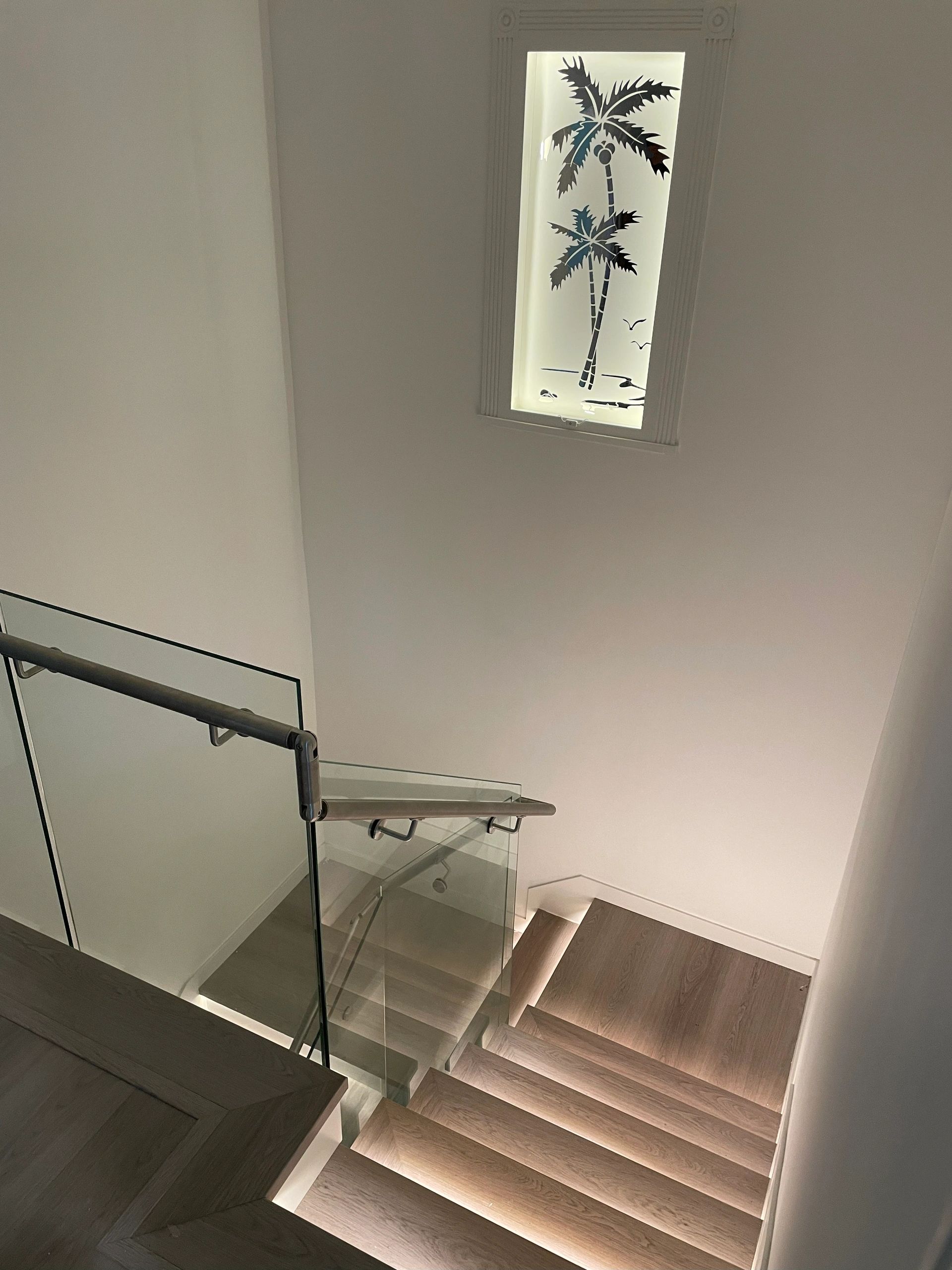 Modern glass staircase interior design in Vancouver home