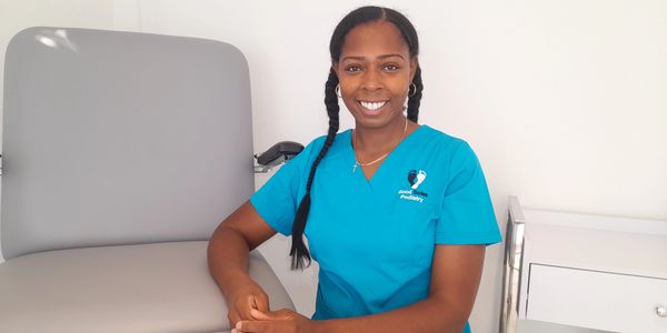 Friendly happy smiling nice podiatrist chiropodist medial aesthetician