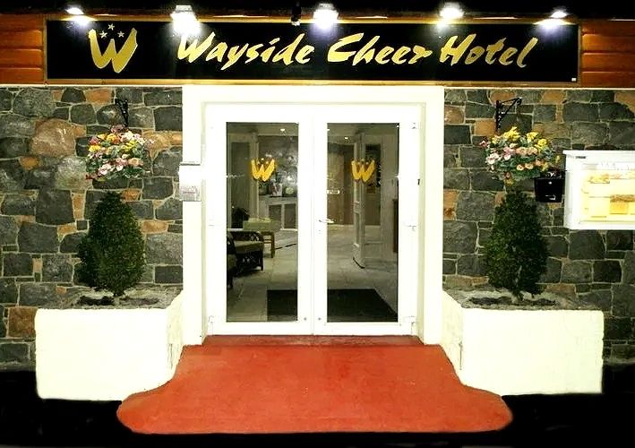 Front Entrance of the Wayside Cheer Hotel