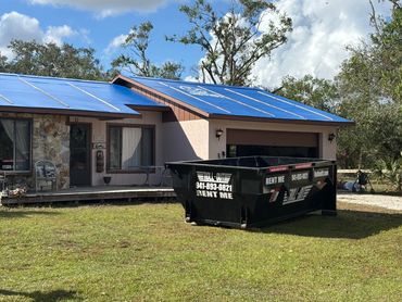 Roof tearoff residential home clean up 14 yard