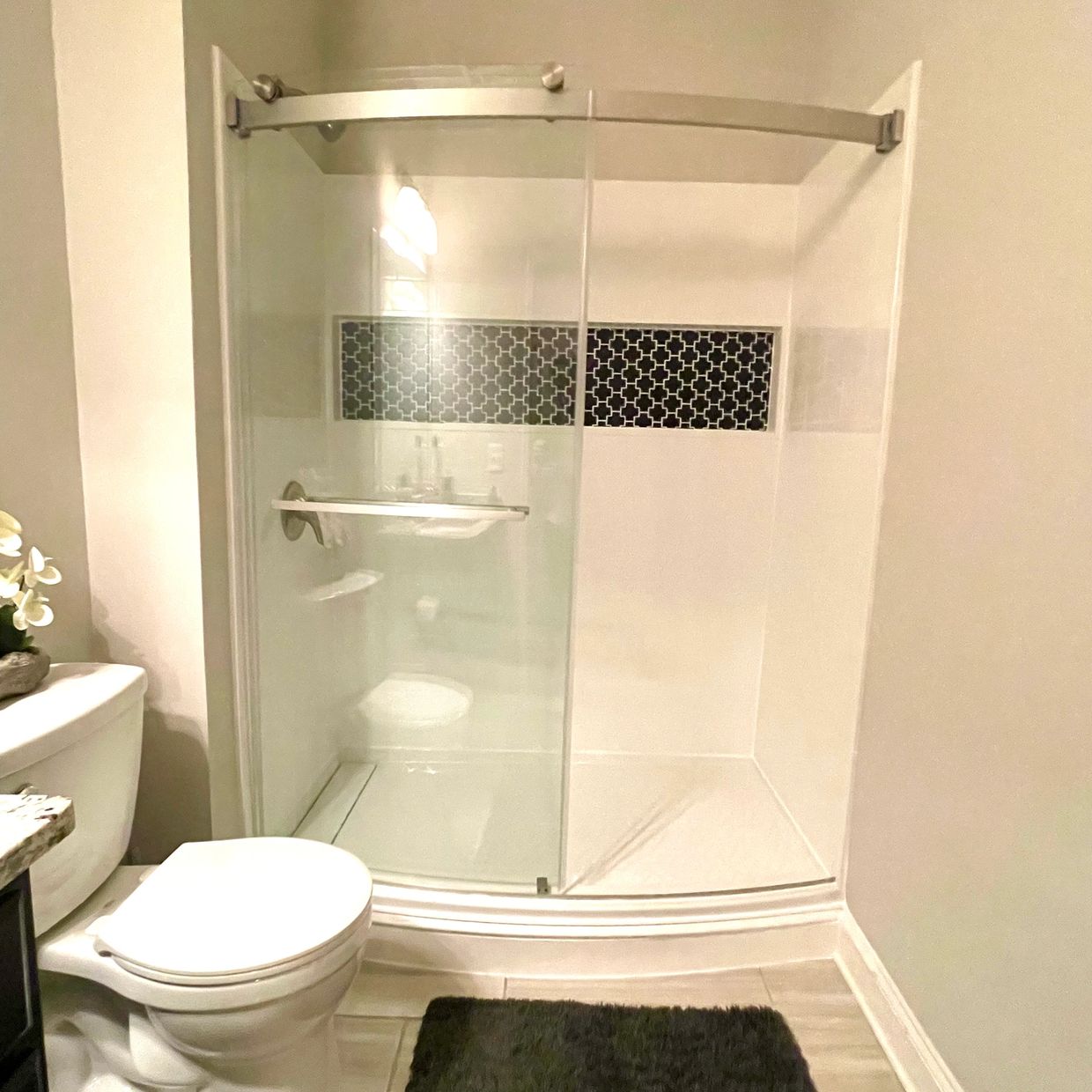 A recently renovated conversion from shower to bathtub.