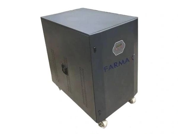 Black metal cabinet on wheels labeled 'Farma'.