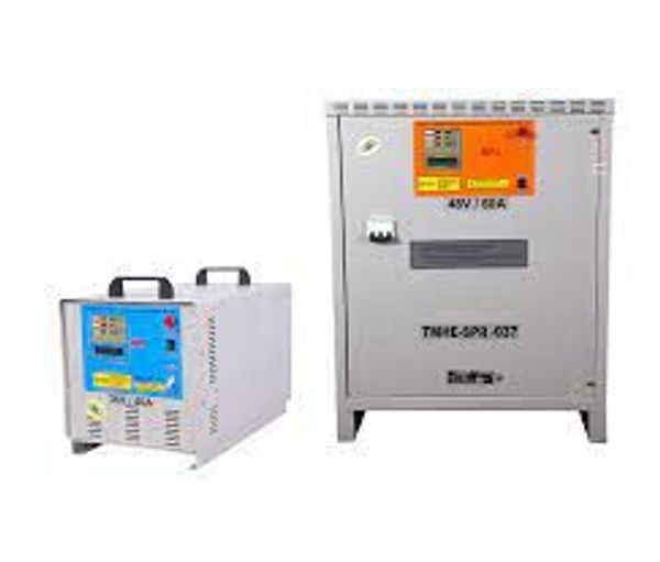 Two industrial machines for electrical applications.