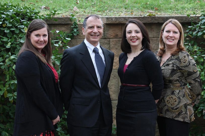 Team members posing for the photograph