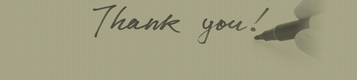Handwriting of thank you message with a black marker