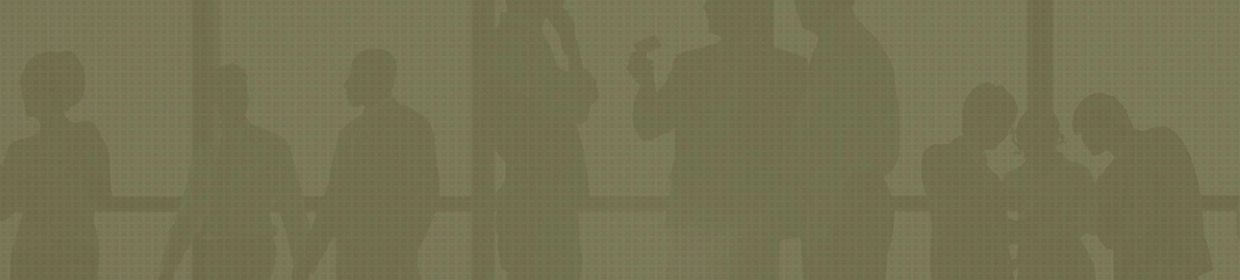 Silhouettes of business people having a discussion by the window