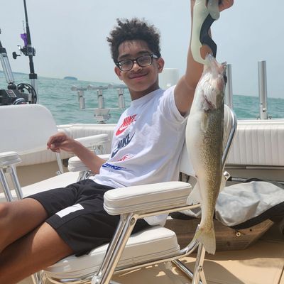 Cayden Nelson 13 Holding his very first Walleye