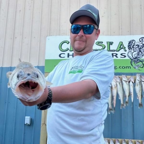 Captain josh posing with a Walleye