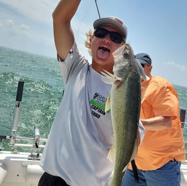 Captain Thad with a 28" Walleye