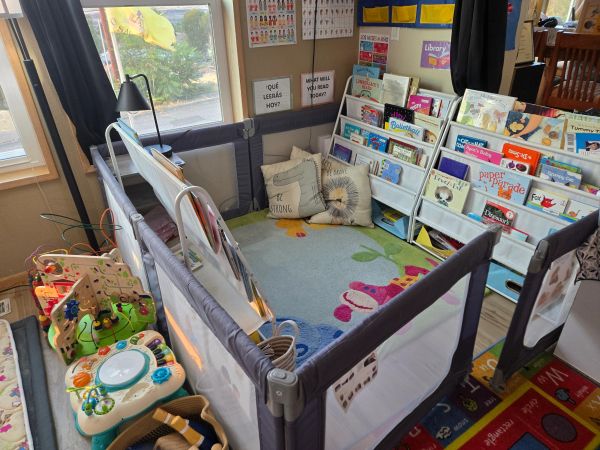 Cozy children's reading and play area with books and toys.