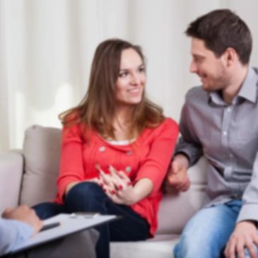 Couple in therapy working with counselor