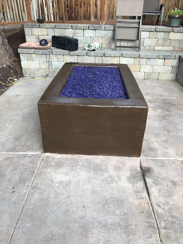 Poured in place concrete fire pit, Blue glass, Natural Gas, rectangular, linear