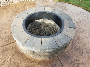 Belgard circular fire pit, wood burning fire pit. 