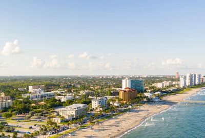 Rendition Of Deerfield Beach and Boca Ratonfrom over the water, taken from an aerial photo. 