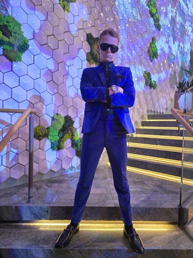 See-Money is a well-dressed & mannered young man 