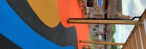 Playground with wetpour surface installed by Primary Play UK