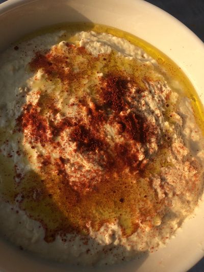 Homemade hummus with paprika and olive oil