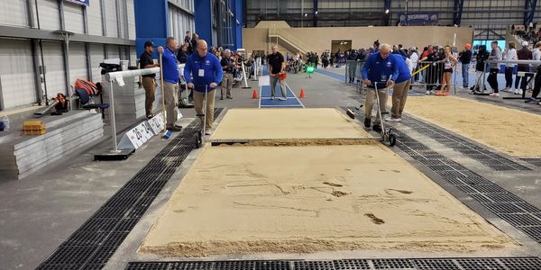 a jump pit being leveled with the Pit Finish Rake