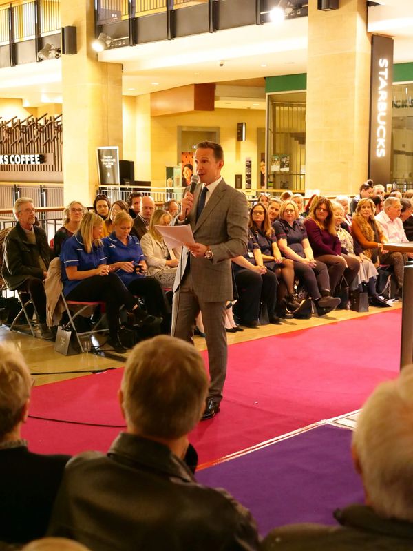 Event host Jeremy Sallis at ACT Charity Breast Cancer Fashion Show at Grand Arcade in Cambridge