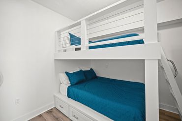 Custom built-in queen-over-queen bunk beds at Serenity Cove luxury rental