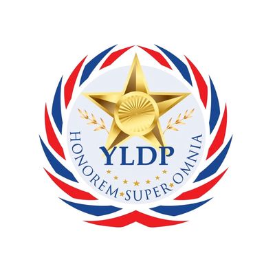 A gold star emblem with a red, white, and blue laurel wreath and the text YLDP.