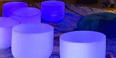 Sound bath with crystal singing bowls at Empow3r Yoga