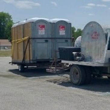 portable toilet rental on a truck
