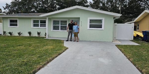 Donte and Doc, his father, at a new short-term rental and future retirement property in Florida. 