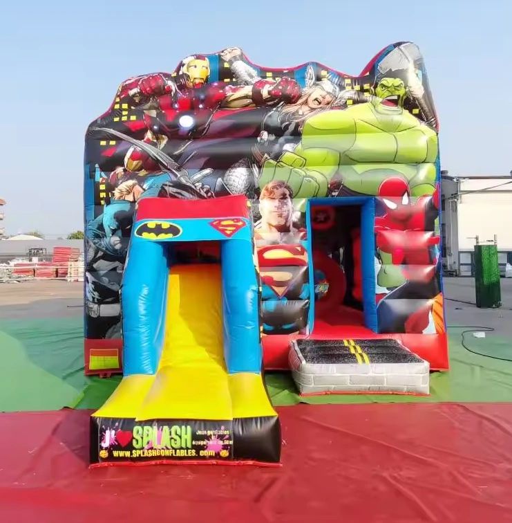 Colorful inflatable bounce house featuring superheroes like Iron Man, Hulk, and Superman with a slide and entrance.