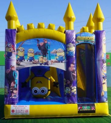 Minions-themed inflatable bounce house with bright yellow towers.