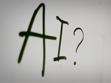 AI yazısı ile yanında bir soru işareti