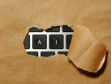 AI tuşlarının yırtılan bir kağıttan klavyede görünmesi