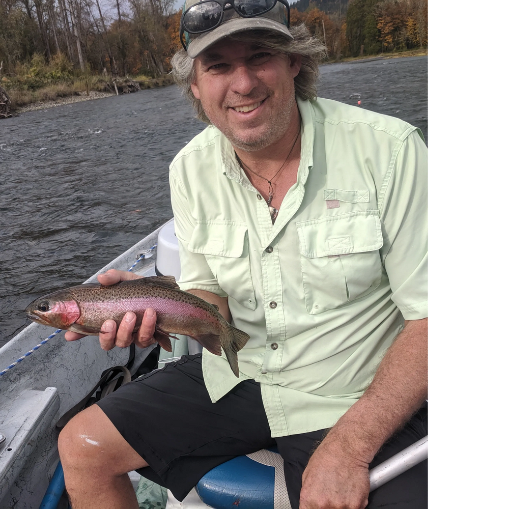 Fishing with Ferris Guide Service head Guide Ferris Tolman with a Mckenzie River RedsideTrout