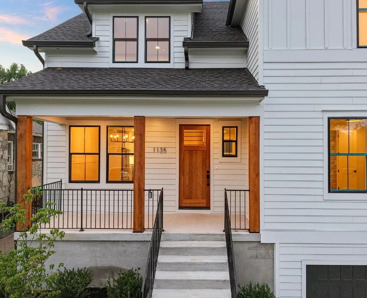 Exterior front of a modern farmhouse residential new construction in East Nashville by CJMC Build
