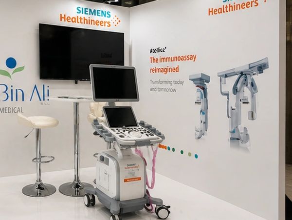 Medical imaging equipment displayed in a Siemens Healthineers booth at a medical event.