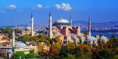 Historic Hagia Sophia with city backdrop.