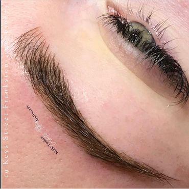 freshly completed eyebrow microblading.