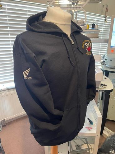 Black jacket with eye-catching prints.