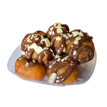 Golden pastries drizzled with chocolate and topped with almond slices.