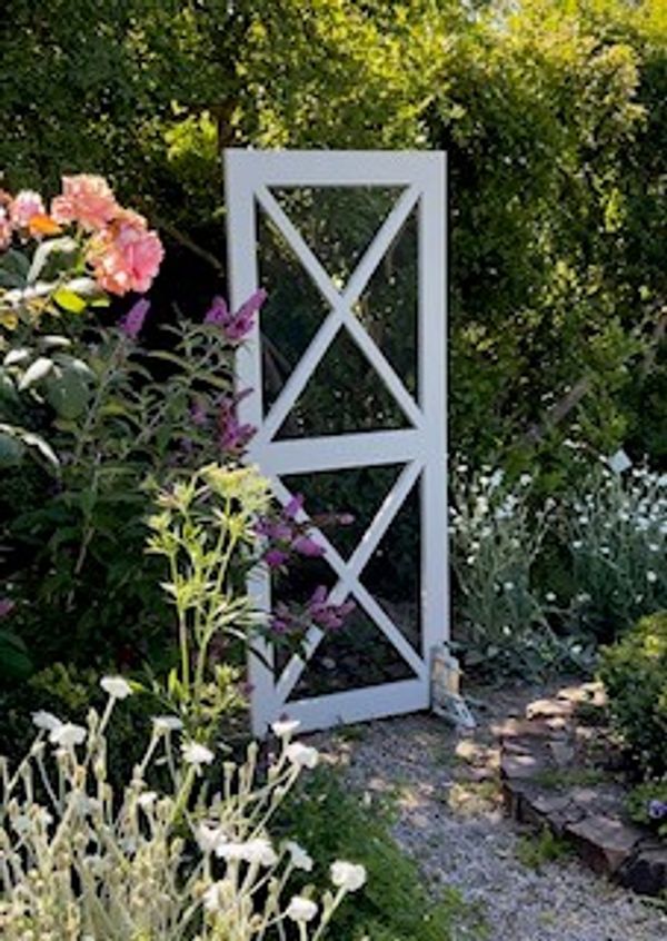 White Hamptons style door with x-bracing