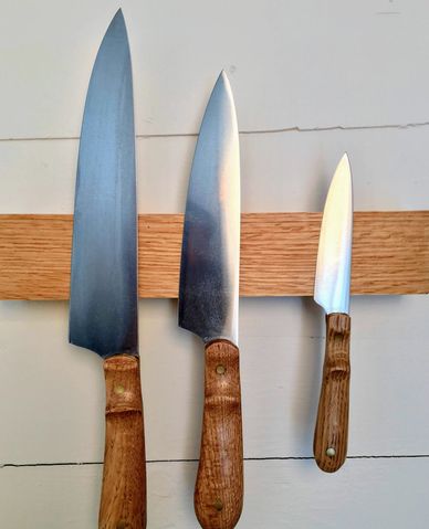 Custom magnetic knife holder with matching Oak handled knives