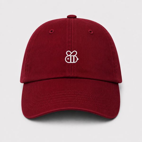 Maroon baseball cap with a white embroidered bee design on the front.