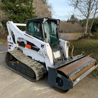 Bobcat Skidsteer with roller attachment