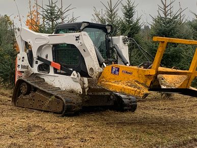 Bobcat Skidsteer with brush cutter attachment for clearing