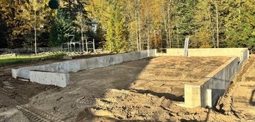 Concrete foundation in an open field
